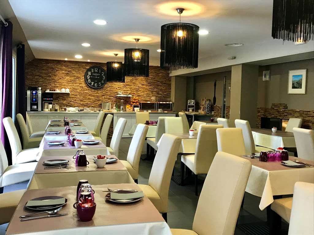 双鱼马雷贝斯特韦斯特酒店 乌伊斯特勒昂 餐厅 照片